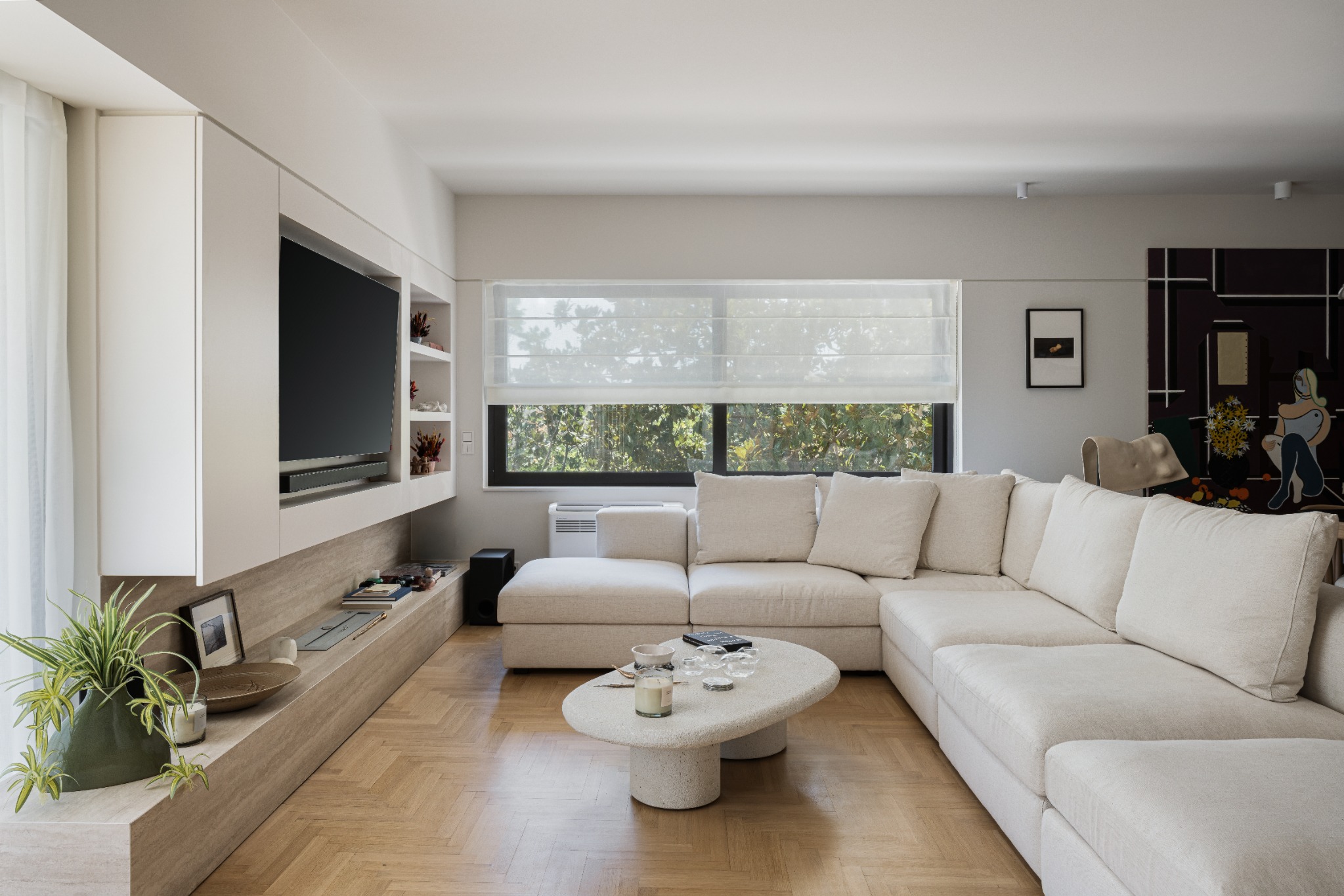 Residential Interiors — Voula, living room with sofa and integrated TV, photograph 2
